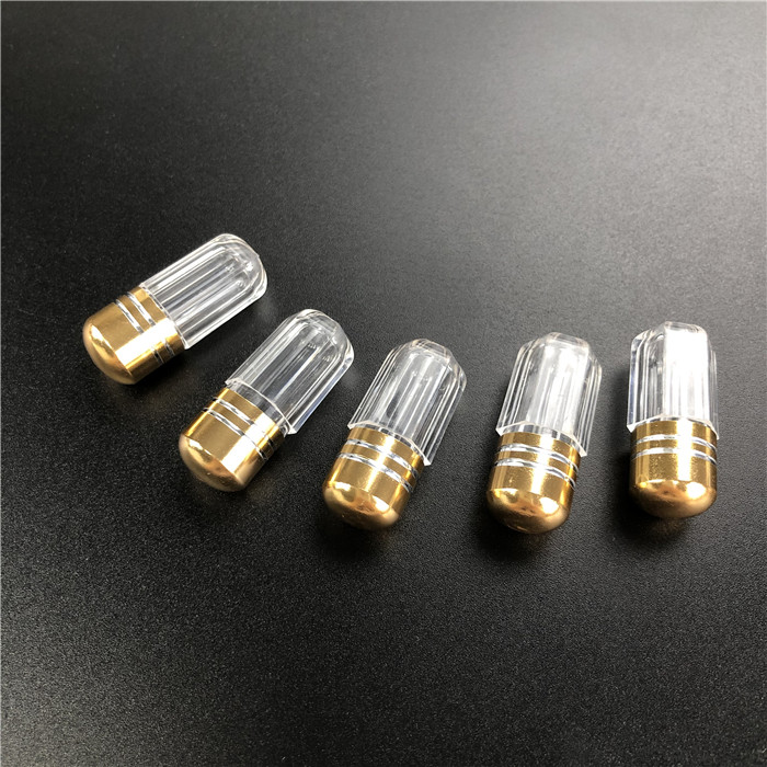 Ein Plastikbehälter mit Metallspülung für männliche Verbesserungspillen.