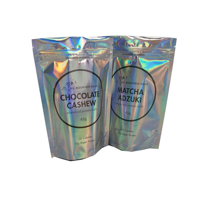 Ganz eigenhändig geschrieber CYMK-Reißverschluss stehen oben Beutel für Protein-Bälle