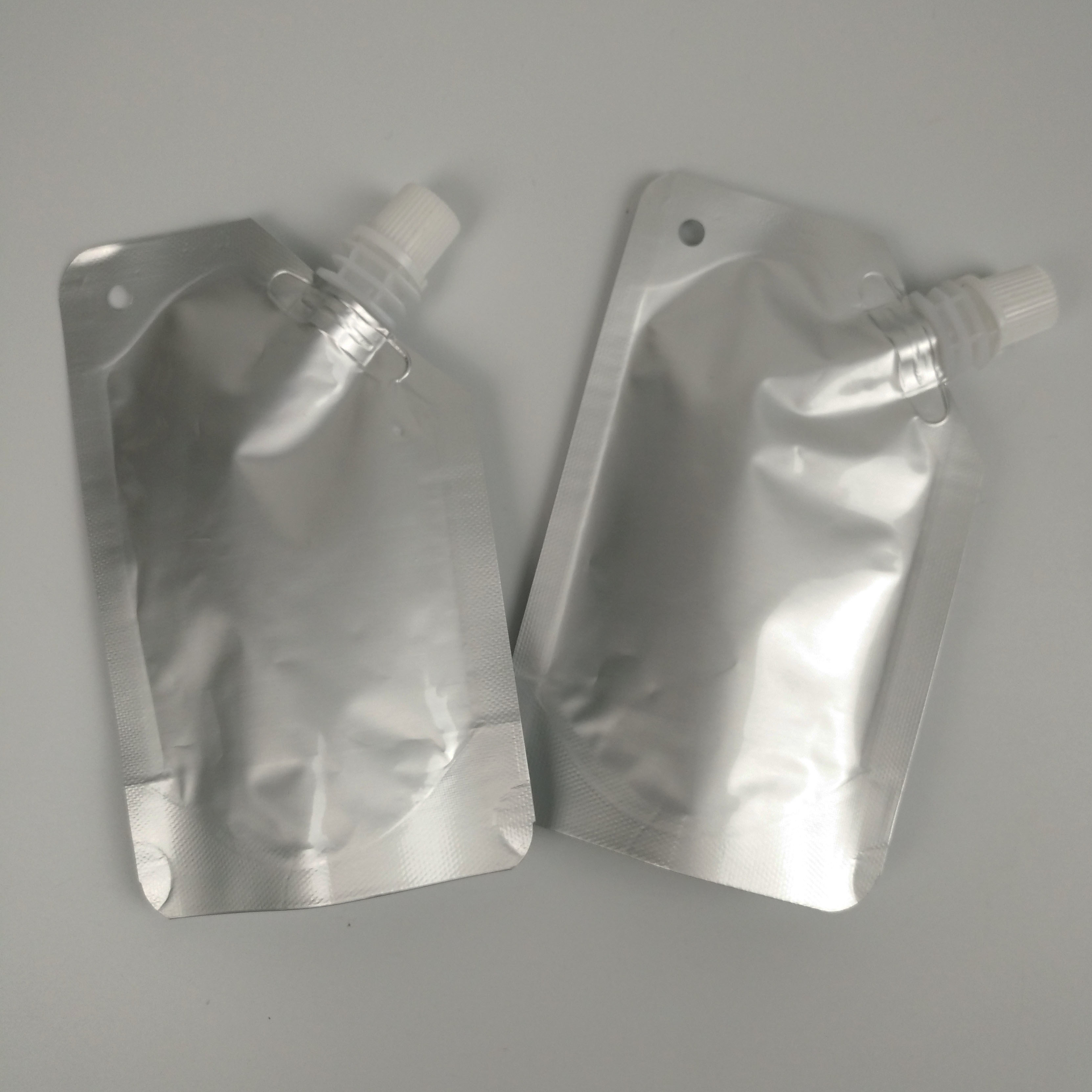 Aluminiumtüllen-Beutel-Stand herauf das ätherische Öl, das flüssige Verpackentasche - herausgespritzte Wasser Spouch-Wein-Aluminiumtasche verpackt
